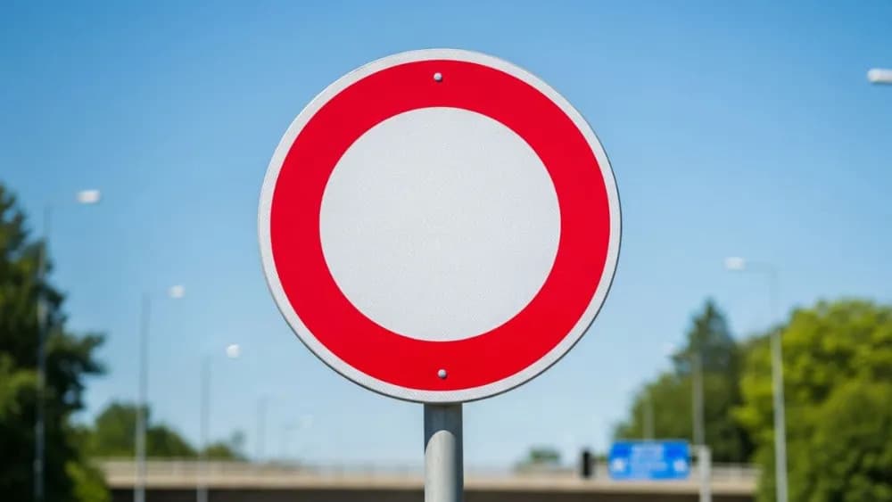 O que significa a nova placa de trânsito com um círculo vermelho e branco no centro?